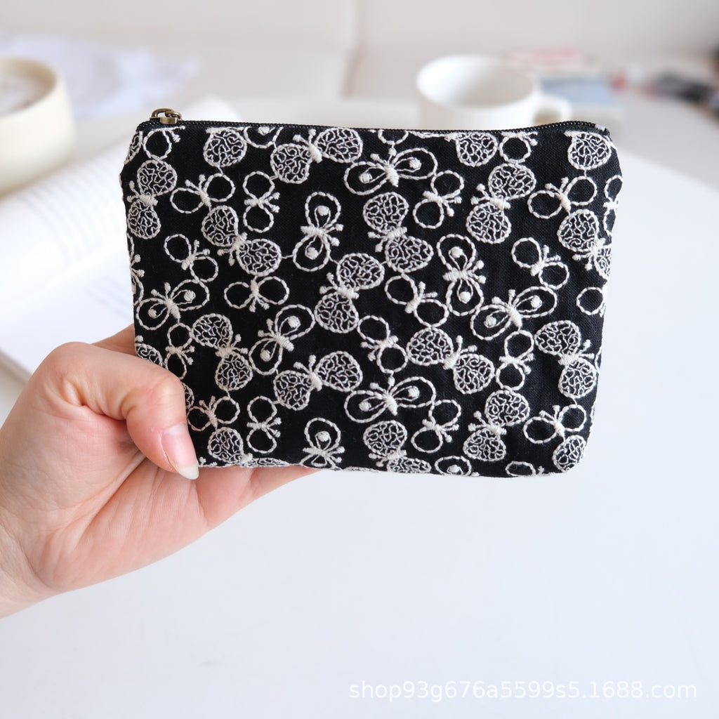 CouldNook Embroidered Cosmetic Pouch - Delicate Motifs And Textured Stitching