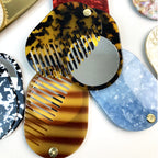 CouldNook Oval Mirror Comb - Patterned Acetate and Gold-tone Swivel Pivot