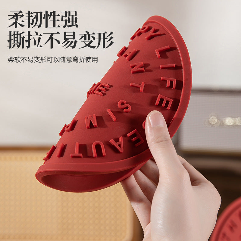 CouldNook Lettered Silicone Trivet - Raised Words And Round Tabletop Shape