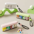 CouldNook Slim Pill Organizer - Divided Interior And Wrist Loop